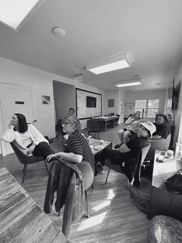 Team seated in a workshop